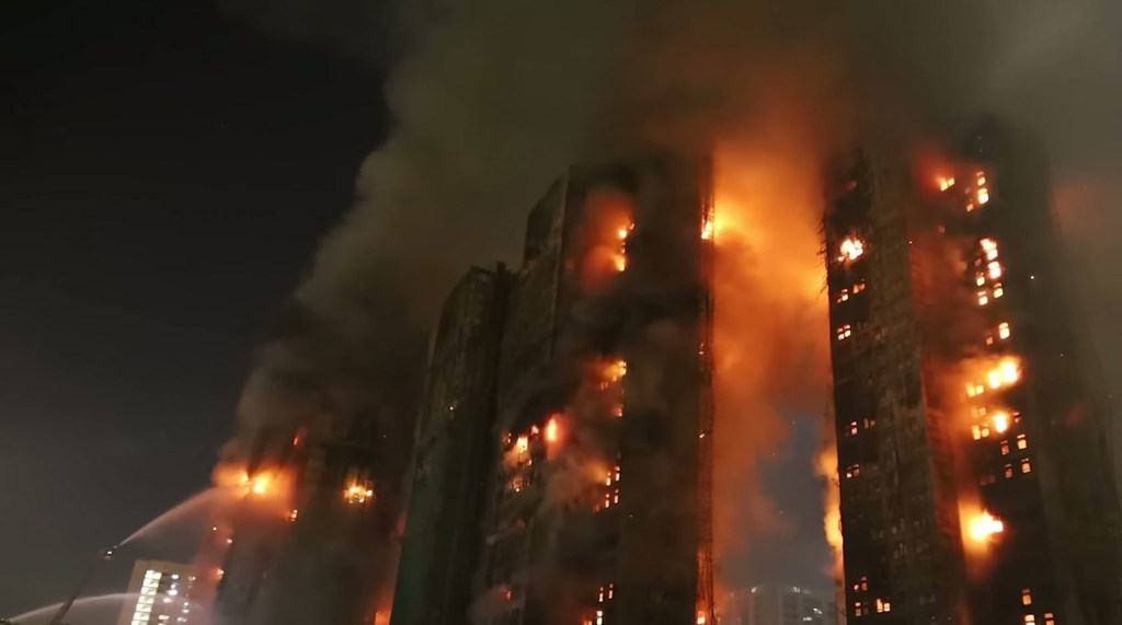 Wang Fung Court apartment complex buildings on fire in Hong Kong.